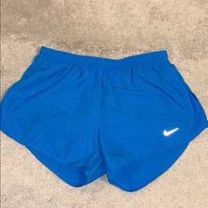 Nike blue patterned running shorts